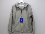a grey jacket with a blue tag hanging on a hanger