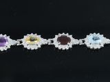 an image of a black background with a row of multicolored bracelets