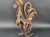 a sculpture of a rooster made out of wood