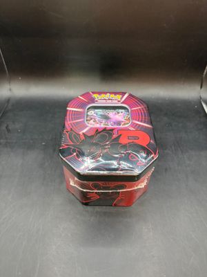a small tin box with a picture of a woman on it
