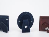 three pieces of blue velvet and a small wooden box