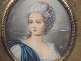 painting of a woman in a blue dress with a tiable on her head