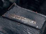 a close up view of a metal box with a sign on it