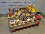 a crate of assorted items sitting on the floor