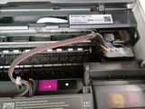 a printer that is sitting on top of a table
