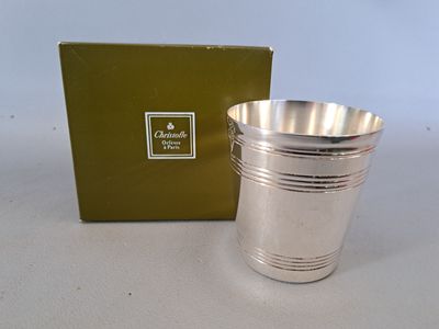 silver plated cup with a box on a white surface