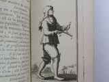 an open book with a drawing of a man holding a bird in his hand