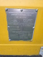 T49: Container maritime jaune avec établi et étau (photo 2)