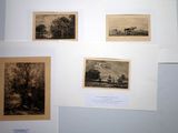 four pictures on the wall of a room with pictures on it
