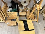 a pile of boxes that are sitting on the floor
