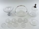a lot of glass items that are on the table