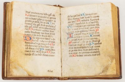 an open book with a picture of a man on it