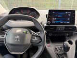 the interior of a car with a steering wheel, dashboard, and dash board