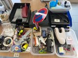 a table with a lot of office supplies on it
