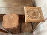two wooden stools sitting next to each other on the floor