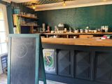 a chalk board in front of a chalk board with a chalk drawing on it