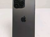 an apple iphone 11 is shown with a camera attached to the back of it