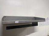 an image of a stainless steel shelf in a kitchen