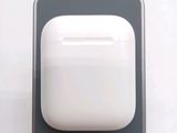 an apple airpods sitting on top of a table