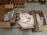many boxes that are sitting on a pallet in the warehouse