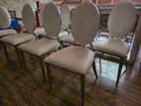six chairs that are sitting in a row on the floor