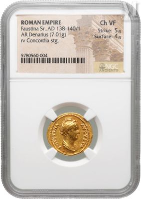 a gold coin with the image of a roman emperor on it