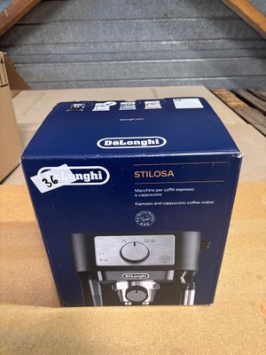 a box of a coffee maker sitting on top of a table