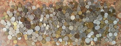 a lot of coins that are on the wall