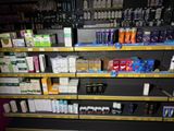 many different types of products on the shelves in the store