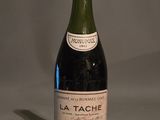 a bottle of wine that is sitting on a table