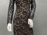 a mannequin mannequin dress with long sleeves and black lace
