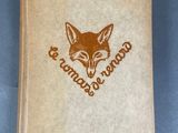 an old book with a picture of a fox on it