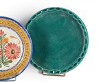 two plates that are sitting next to each other on a table