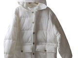 the jacket is white and has a hood that is attached to it