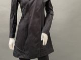 an image of a mannequin wearing a black coat and leggings