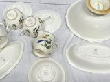 a table with a lot of plates and bowls on it
