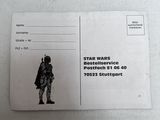 a close up of a postcard with a star wars character on it