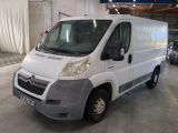 a white van that is parked inside of a building