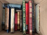 a box full of books that are sitting on a table