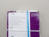 a box of cookies and a cookie cutter on a table
