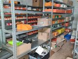 a room with a lot of boxes and boxes on the shelves