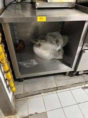 a microwave with a bag of food inside of it