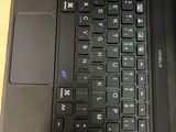a close up of a laptop keyboard on a table