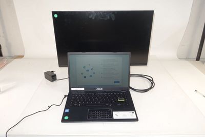 a laptop computer that is sitting on a table