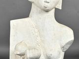 an image of a statue of a woman holding a baby