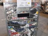 a cart with a lot of items in it in a warehouse
