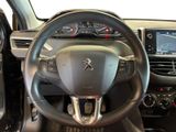 the interior of a car with a steering wheel and dashboard controls