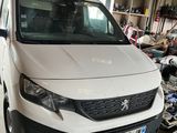 a white van that is parked in a garage