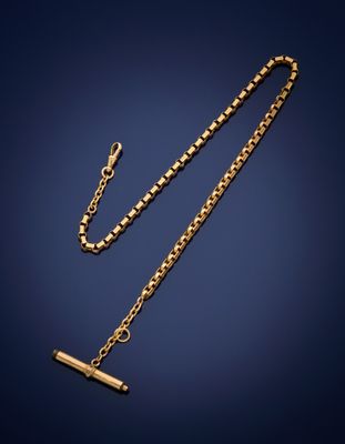 a gold necklace with a cross on a chain