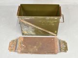 a small metal box with a metal handle and a metal box with a metal handle